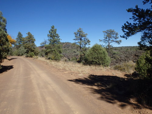 GDMBR: Northbound on CR-42, the Continental Divide on the left side, and the Malpais Lava Bed on the right side.